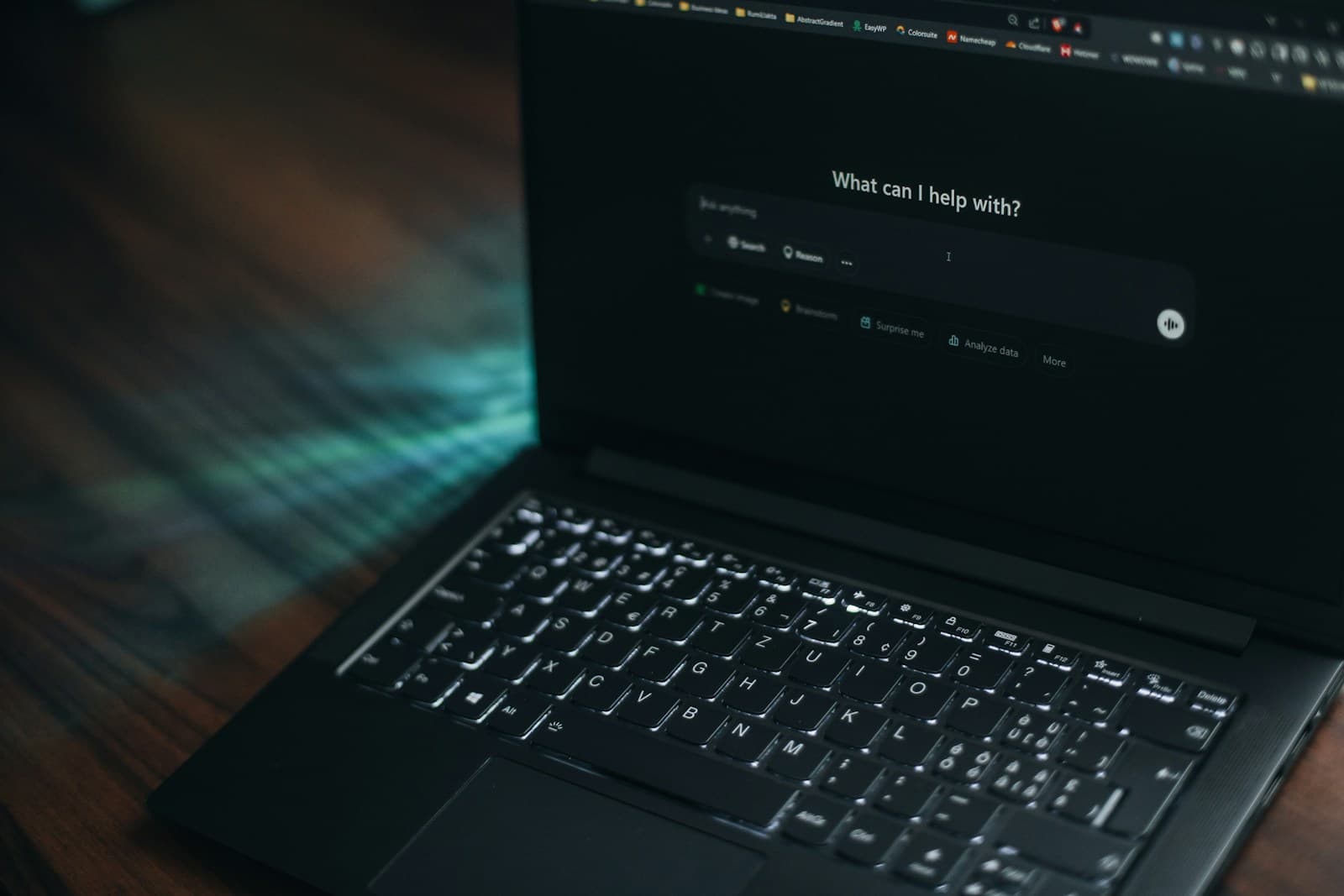 Laptop displaying an AI assistant search interface