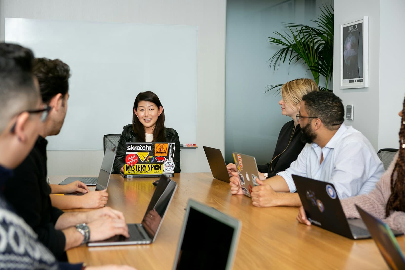 People in a meeting discussing app development